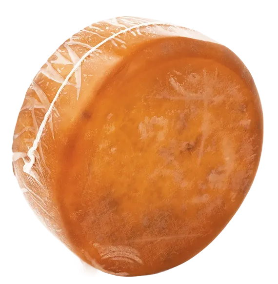 Cheese wheel in shrink packaging